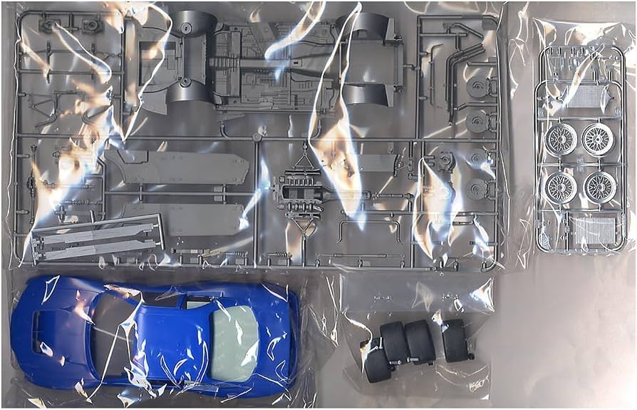 Tamiya 1/24 Calsonic Nissan Skyline GT-R (R33) Scale Model Kit 24184
