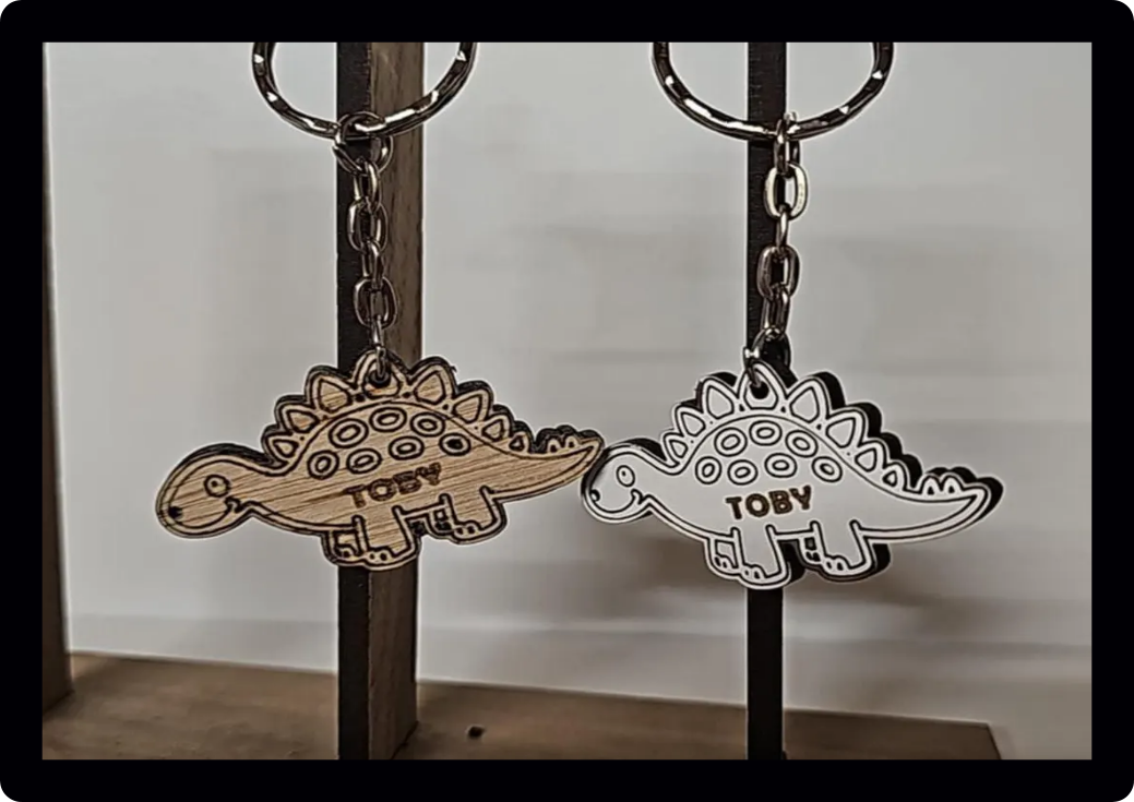 Personalised engraved wooden dinosaur keyring